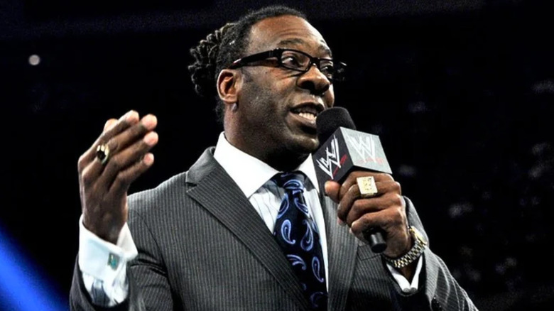 Booker T speaking into a microphone