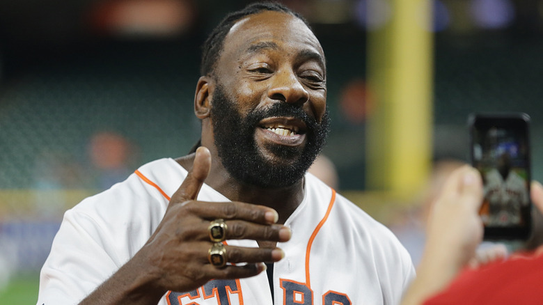 Booker T wearing his WWE Hall of Fame rings