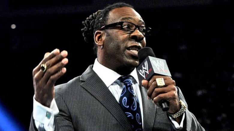 Booker T speaking into a microphone