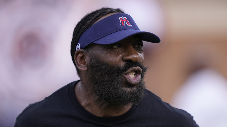 Booker T puckering up his lips