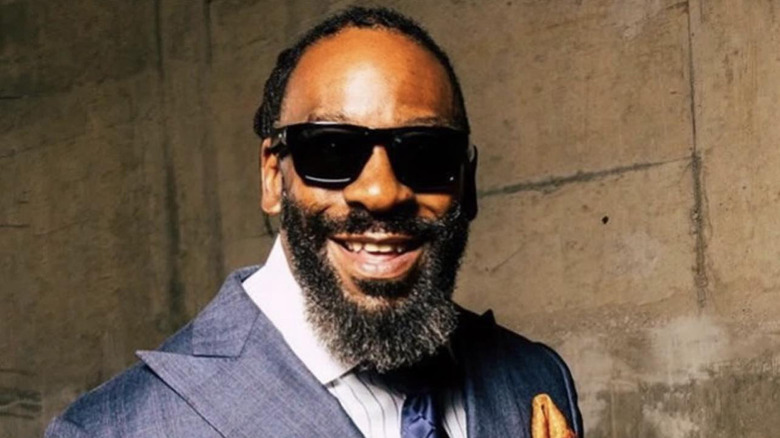 Booker T smiling in shades