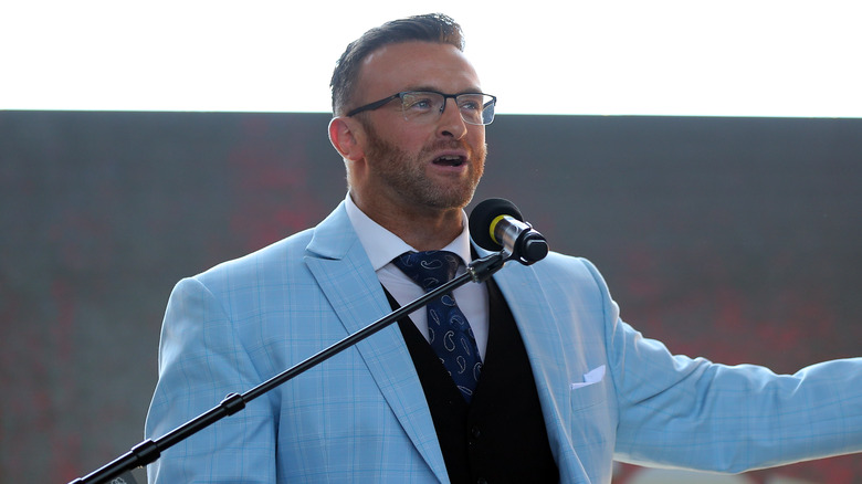 Nick Aldis talking at a press conference