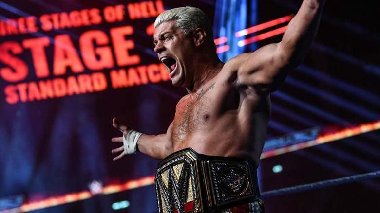 Cody Rhodes yells in the ring to hype up himself and the crowd before his Three Stages of Hell Match against Drew McIntyre on "WWE SmackDown."