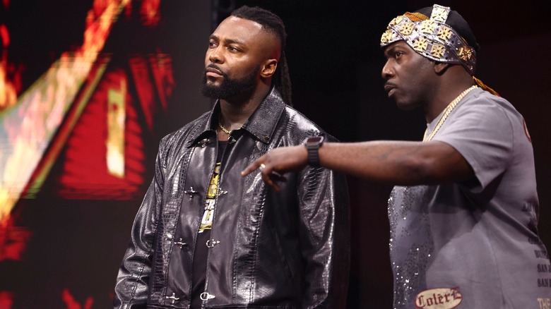 Prince Nana and Swerve Strickland on the entrance ramp
