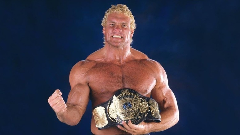Sid Justice poses with the WWE Championship, a title he would carry twice in his highly decorated and beastly career