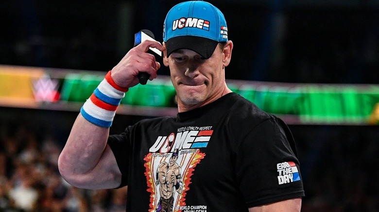 John Cena holding a mic