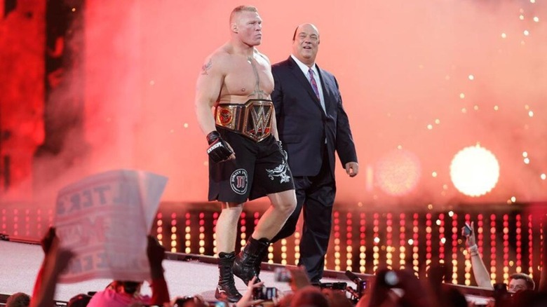 Brock Lesnar and Paul Heyman head down the ramp to the ring at WrestleMania 31.