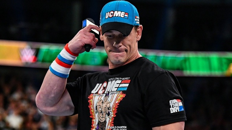 John Cena scratches his head, thinking