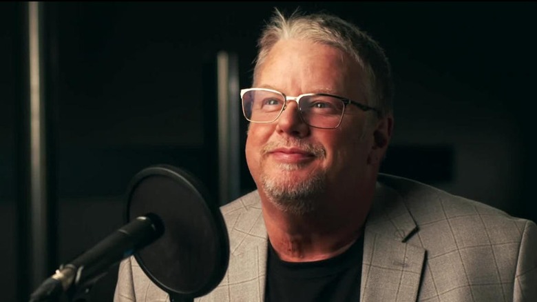 Bruce Prichard Speaks Into A Microphone