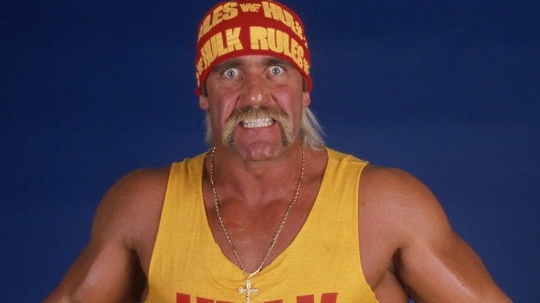Hulk Hogan posing for a promotional shoot with his 