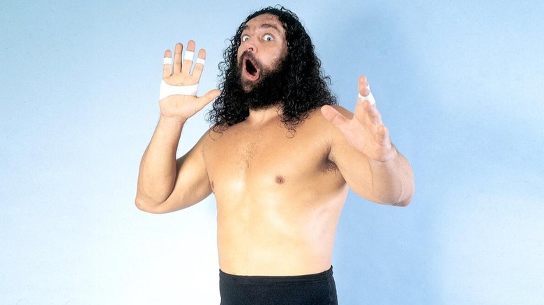 WWE Hall of Famer Bruiser Brody poses for the camera
