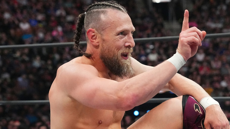 Bryan Danielson holds up one finger