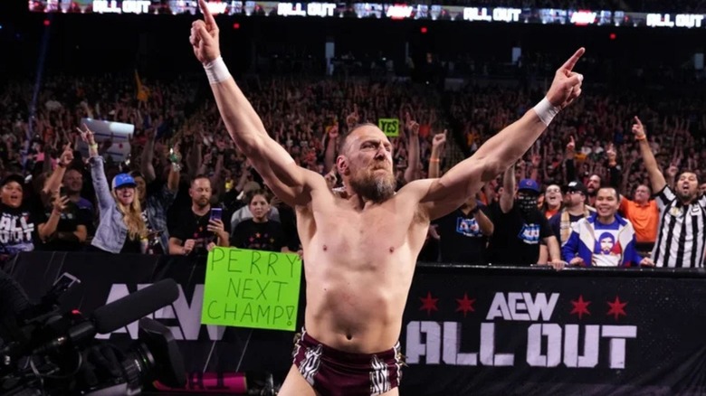 Bryan Danielson poses at ringside before a match at AEW All Out.