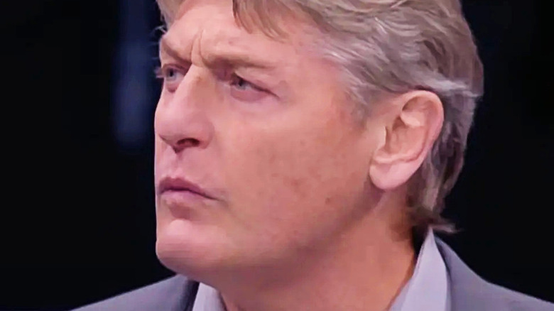 William Regal staring