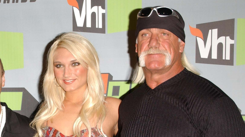 Brooke and Hulk Hogan attending a game between the New York Jets and Miami Dolphins, 2004.
