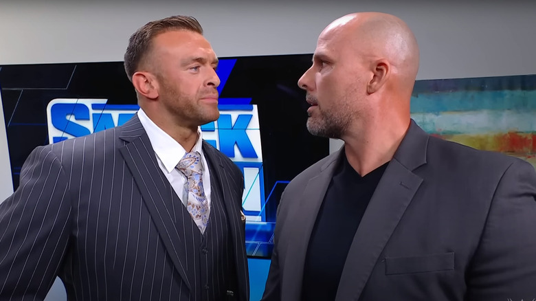 Nick Alids and Adam Pearce staring at each other