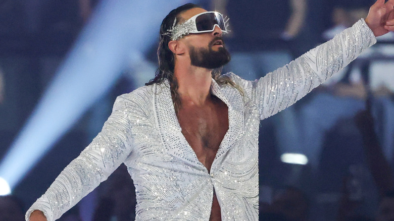 Seth Rollins is wearing a silver sparkly jacket