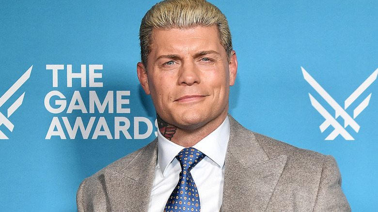 Cody Rhodes wearing a suit