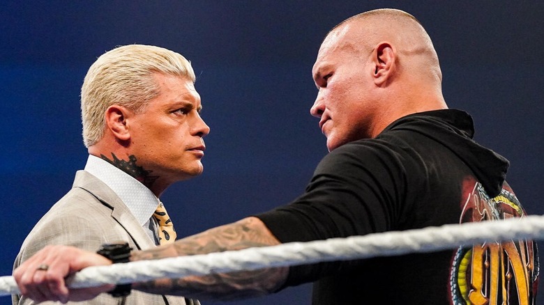 Randy Orton and Cody Rhodes lock eyes in the ring during one of their talking segments