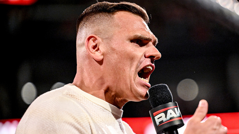 GUNTHER speaking into a WWE Raw mic