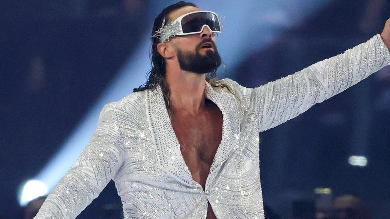 Seth Rollins is wearing a silver sparkly jacket