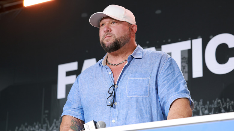 WWE Hall of Famer Bully Ray awaits a question during a press event