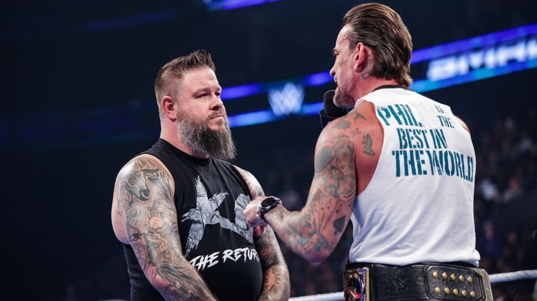 Undisputed WWE Champion CM Punk cuts a promo on the newly-returned Kevin Owens in the ring during the August 7, 2026 edition of 