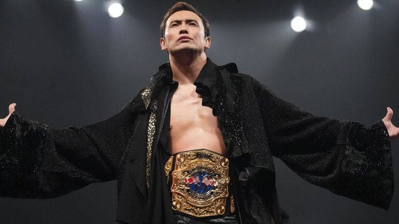 Kazuchika Okada with the AEW Unified Championship during the AEW Worlds End pay-per-view, 2025.