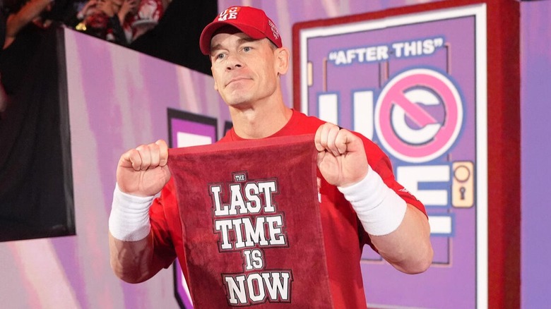 John Cena poses with his "The Last Time Is Now" towel in front of the Springfield, Massachusetts crowd on "WWE Raw"