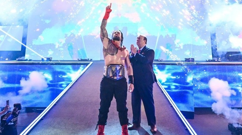 Roman Reigns acknowledges himself with Paul Heyman by his side
