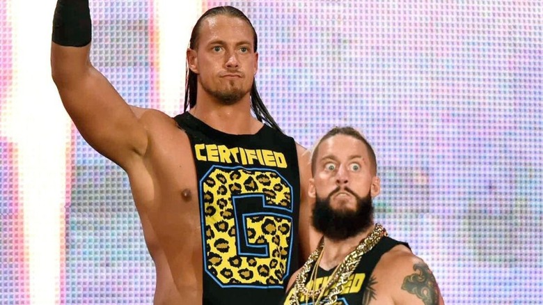 Big Cass poses behind Enzo Amore on the stage as they come out to confront The Club on an episode of 