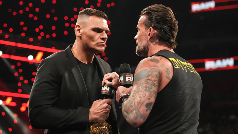 Gunther and CM Punk in the ring