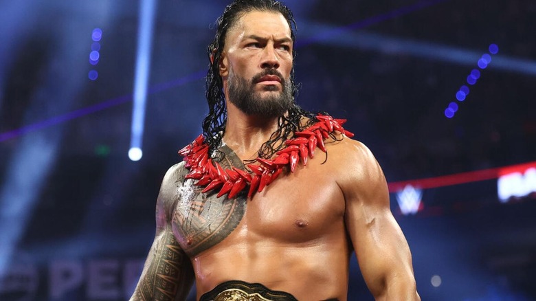 World Heavyweight Champion Roman Reigns stands in the ring and looks toward his opponent, Penta, ahead of a match for the title on the September 14, 2026 edition of 