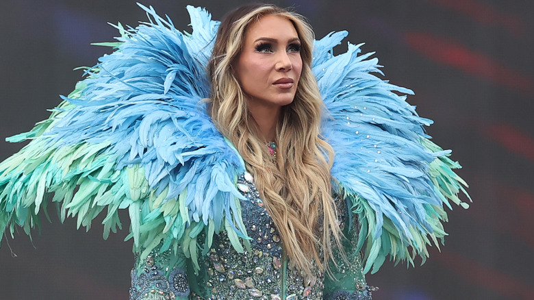 Charlotte Flair wearing a light blue ring robe