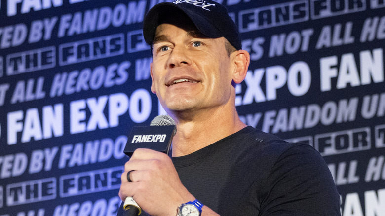 John Cena holding his microphone