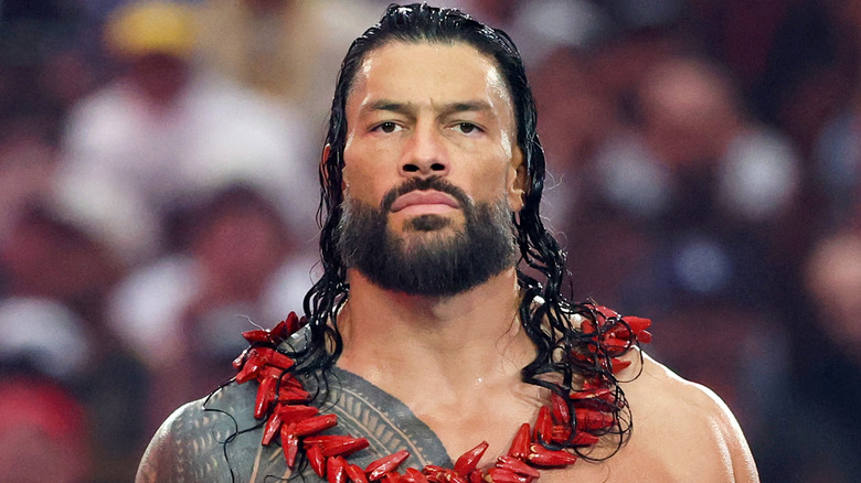 Roman Reigns wearing an Ula Fala