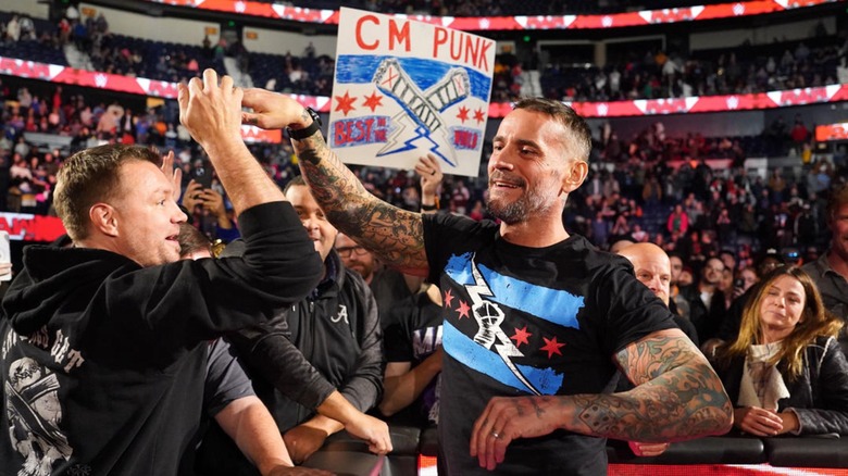 CM Punk Embraces A Fan On WWE Raw