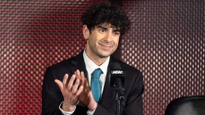 Tony Khan Claps During An AEW Media Scrum