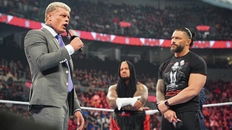 Cody Rhodes with Roman Reigns and Solo Sikoa