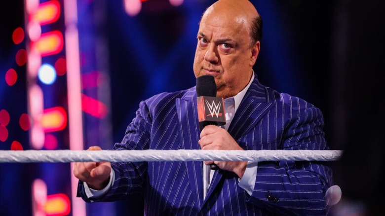 Paul Heyman cuts a promo in the ring during an episode of 