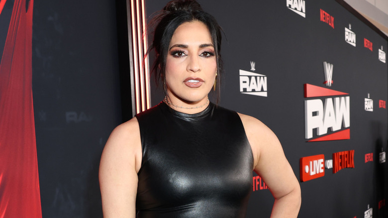 Raquel Rodriguez wearing a black dress