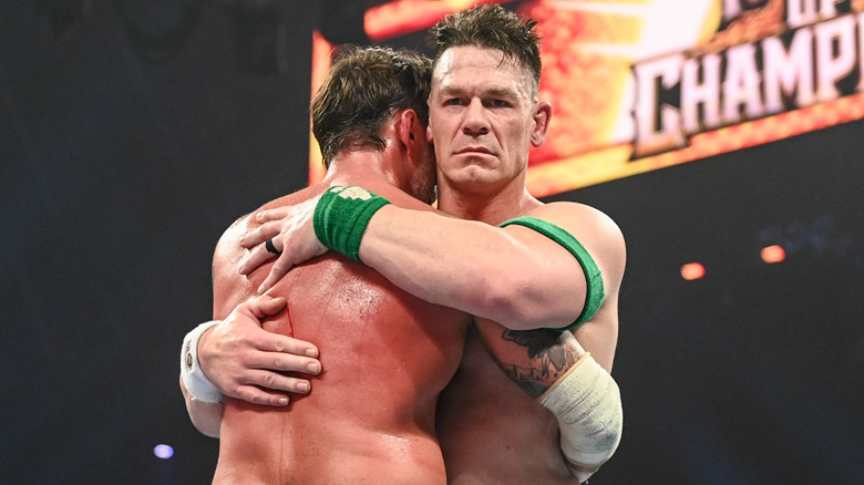 John Cena hugging CM Punk at WWE Night of Champions