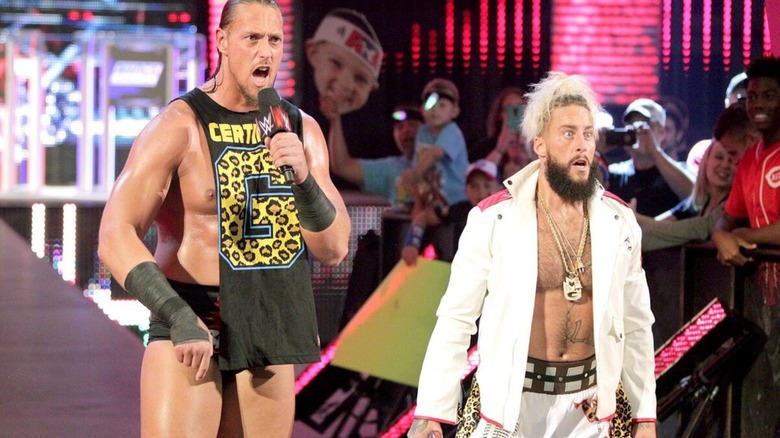 Big Cass cuts a promo as Enzo Amore stands beside him on the ramp during an edition of WWE programming.