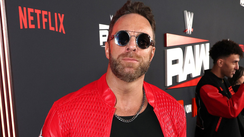 LA Knight wearing sunglasses