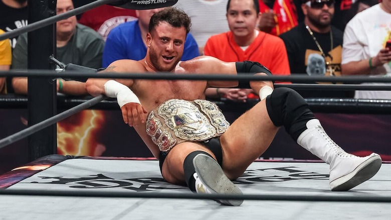 MJF sitting with his championship