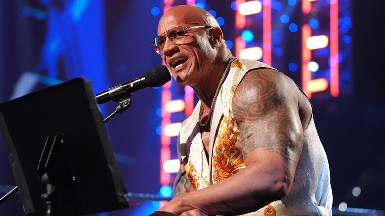 The Rock sings a song on "WWE Raw"