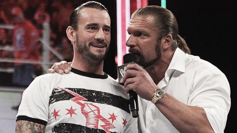 Triple H speaking to CM Punk