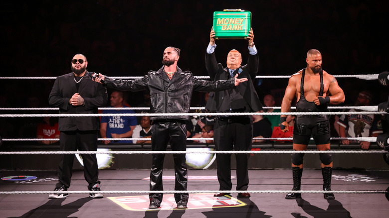 Bronson Reed, Seth Rollins, Paul Heyman, and Bron Breakker together