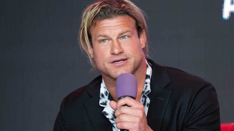 Nic Nemeth holding a microphone