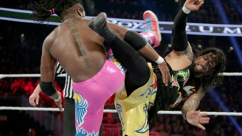 Kofi Kingston and Jey Uso during a double superkick spot at their Royal Rumble clash, 2016.